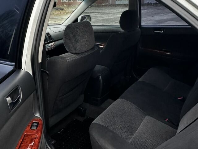 Сірий Тойота Камрі, об'ємом двигуна 2.4 л та пробігом 302 тис. км за 5800 $, фото 8 на Automoto.ua