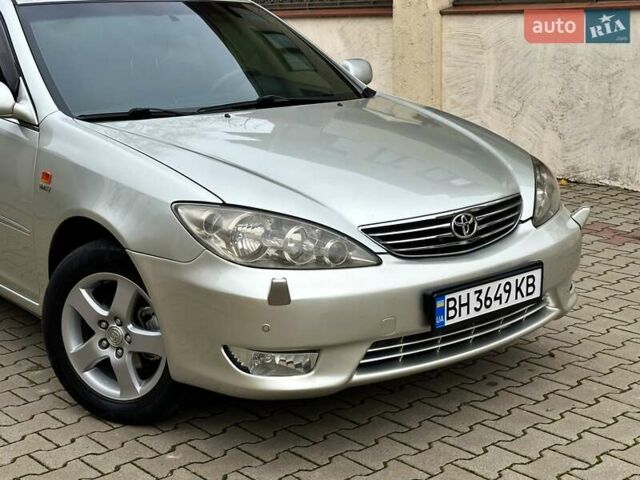 Серый Тойота Камри, объемом двигателя 2.36 л и пробегом 257 тыс. км за 8300 $, фото 18 на Automoto.ua