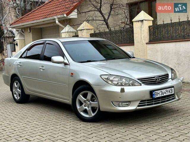 Серый Тойота Камри, объемом двигателя 2.36 л и пробегом 257 тыс. км за 8300 $, фото 16 на Automoto.ua