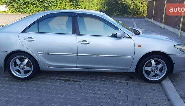 Серый Тойота Камри, объемом двигателя 3 л и пробегом 398 тыс. км за 4900 $, фото 18 на Automoto.ua