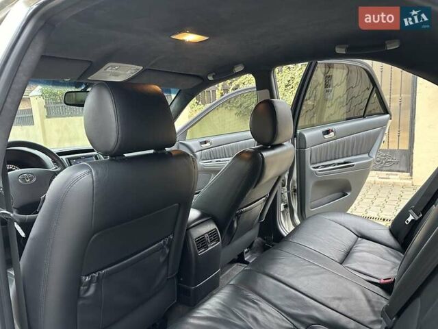 Серый Тойота Камри, объемом двигателя 2.36 л и пробегом 257 тыс. км за 8300 $, фото 53 на Automoto.ua