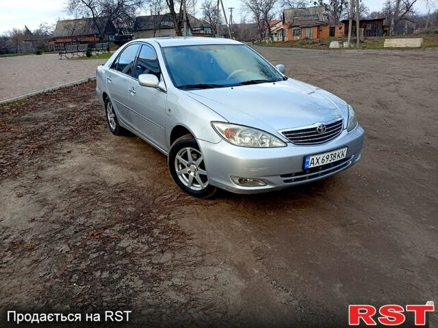 Сірий Тойота Камрі, об'ємом двигуна 2.4 л та пробігом 266 тис. км за 6750 $, фото 2 на Automoto.ua