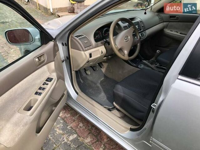 Серый Тойота Камри, объемом двигателя 2.4 л и пробегом 201 тыс. км за 5900 $, фото 11 на Automoto.ua