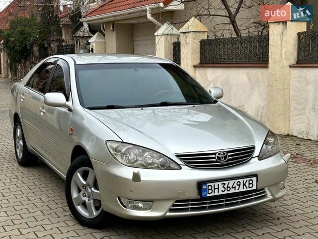 Серый Тойота Камри, объемом двигателя 2.36 л и пробегом 257 тыс. км за 8300 $, фото 14 на Automoto.ua