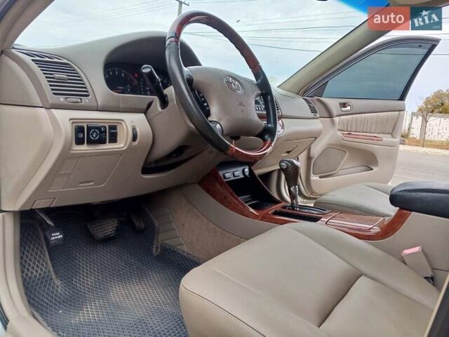 Тойота Камри 2004 в Белгород-Днестровском на Automoto.ua Серый Тойота Камри, объемом двигателя 2.36 л и пробегом 303 тыс. км за 5500 $, фото 32 на Automoto.ua