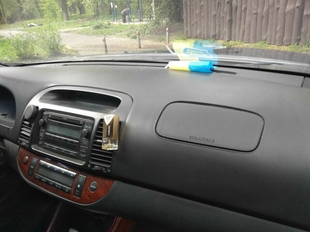 Серый Тойота Камри, объемом двигателя 2.4 л и пробегом 360 тыс. км за 4800 $, фото 6 на Automoto.ua