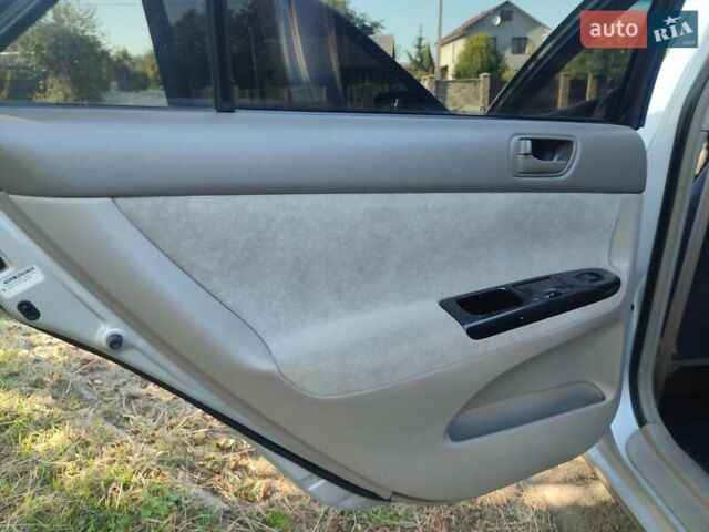 Серый Тойота Камри, объемом двигателя 2.36 л и пробегом 308 тыс. км за 4500 $, фото 10 на Automoto.ua