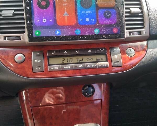 Сірий Тойота Камрі, об'ємом двигуна 2.36 л та пробігом 411 тис. км за 6000 $, фото 16 на Automoto.ua