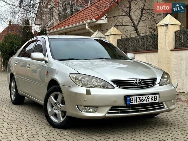 Серый Тойота Камри, объемом двигателя 2.36 л и пробегом 257 тыс. км за 8300 $, фото 20 на Automoto.ua