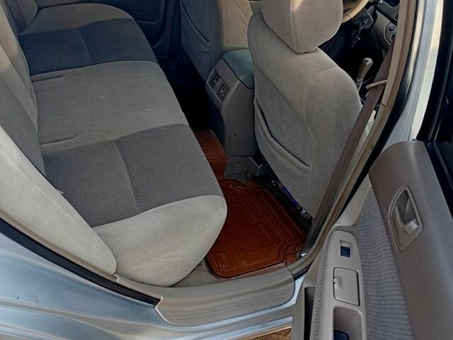 Сірий Тойота Камрі, об'ємом двигуна 2.4 л та пробігом 266 тис. км за 6750 $, фото 5 на Automoto.ua