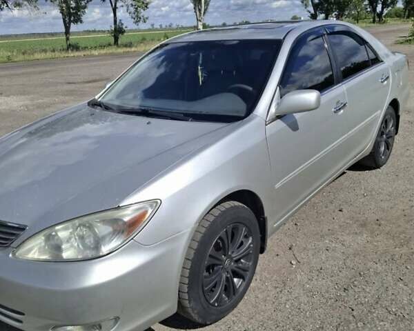 Серый Тойота Камри, объемом двигателя 3 л и пробегом 390 тыс. км за 6200 $, фото 6 на Automoto.ua