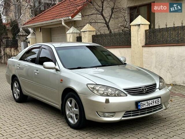 Серый Тойота Камри, объемом двигателя 2.36 л и пробегом 257 тыс. км за 8300 $, фото 31 на Automoto.ua