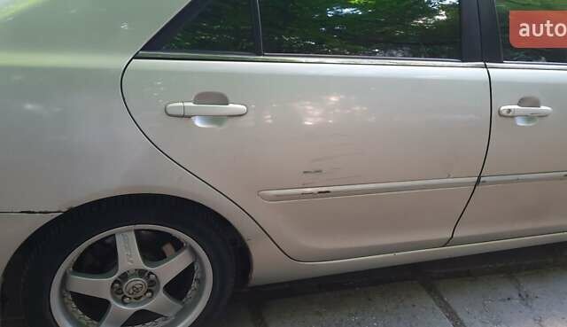 Серый Тойота Камри, объемом двигателя 3 л и пробегом 398 тыс. км за 4900 $, фото 14 на Automoto.ua