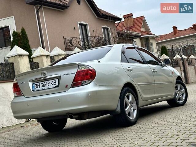 Серый Тойота Камри, объемом двигателя 2.36 л и пробегом 257 тыс. км за 8300 $, фото 11 на Automoto.ua