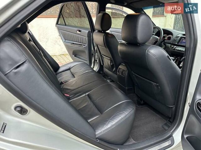 Серый Тойота Камри, объемом двигателя 2.36 л и пробегом 257 тыс. км за 8300 $, фото 55 на Automoto.ua