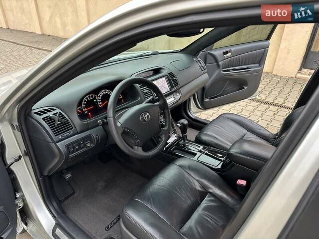 Серый Тойота Камри, объемом двигателя 2.36 л и пробегом 257 тыс. км за 8300 $, фото 44 на Automoto.ua