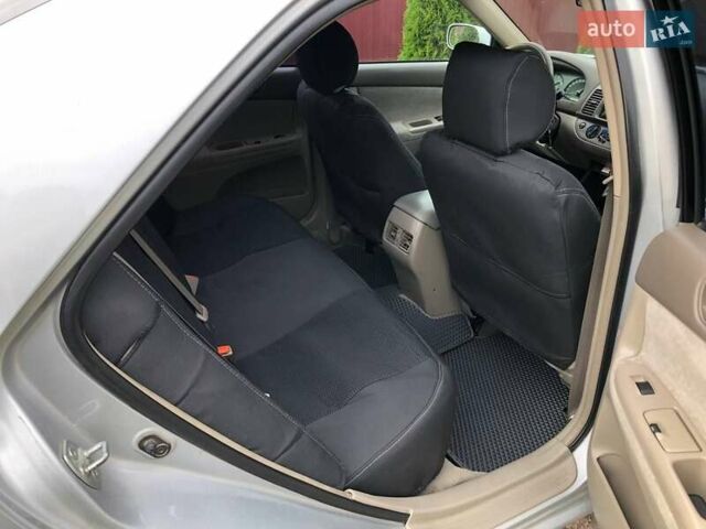 Серый Тойота Камри, объемом двигателя 2.4 л и пробегом 201 тыс. км за 5900 $, фото 8 на Automoto.ua