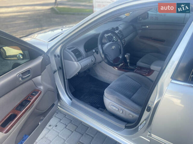 Серый Тойота Камри, объемом двигателя 2.4 л и пробегом 469 тыс. км за 6200 $, фото 13 на Automoto.ua