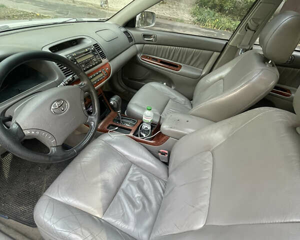 Серый Тойота Камри, объемом двигателя 3 л и пробегом 247 тыс. км за 5000 $, фото 10 на Automoto.ua