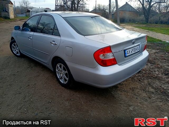 Сірий Тойота Камрі, об'ємом двигуна 2.4 л та пробігом 266 тис. км за 6750 $, фото 3 на Automoto.ua