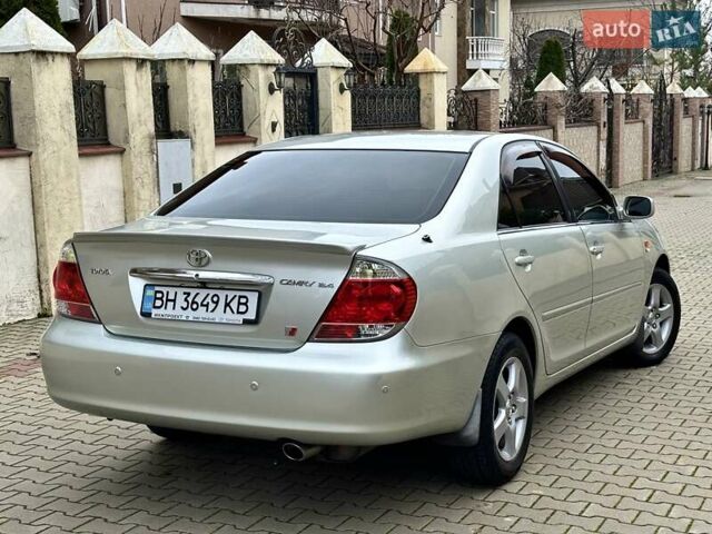 Серый Тойота Камри, объемом двигателя 2.36 л и пробегом 257 тыс. км за 8300 $, фото 8 на Automoto.ua