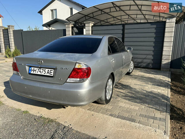 Серый Тойота Камри, объемом двигателя 3 л и пробегом 360 тыс. км за 4900 $, фото 5 на Automoto.ua