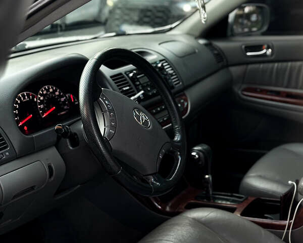 Серый Тойота Камри, объемом двигателя 3 л и пробегом 247 тыс. км за 5000 $, фото 6 на Automoto.ua