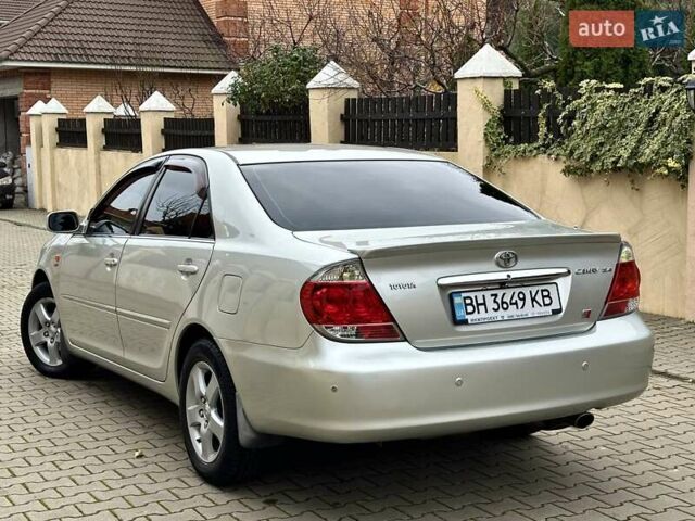 Серый Тойота Камри, объемом двигателя 2.36 л и пробегом 257 тыс. км за 8300 $, фото 19 на Automoto.ua