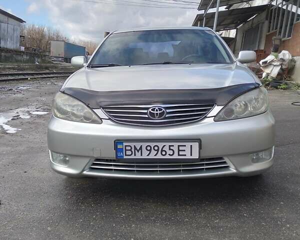 Сірий Тойота Камрі, об'ємом двигуна 2.36 л та пробігом 411 тис. км за 6000 $, фото 2 на Automoto.ua