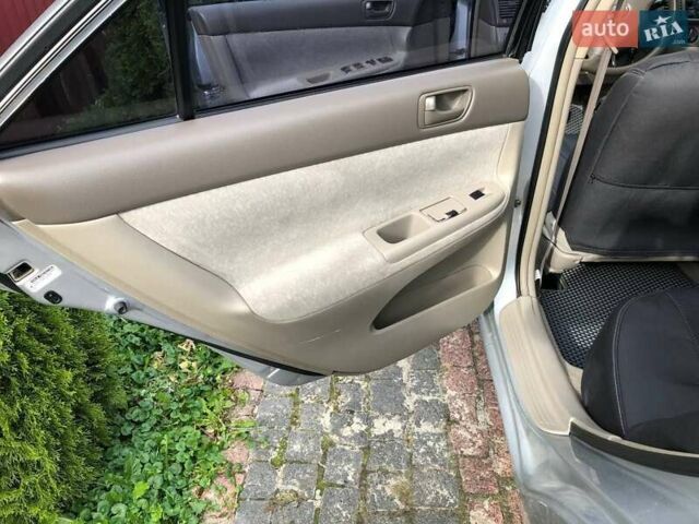 Серый Тойота Камри, объемом двигателя 2.4 л и пробегом 201 тыс. км за 5900 $, фото 10 на Automoto.ua