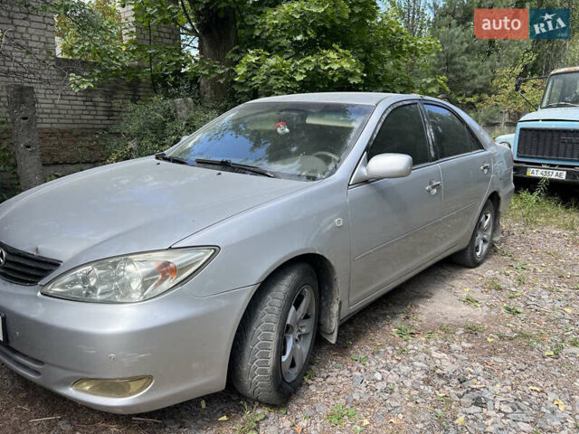 Серый Тойота Камри, объемом двигателя 2.4 л и пробегом 300 тыс. км за 4000 $, фото 2 на Automoto.ua