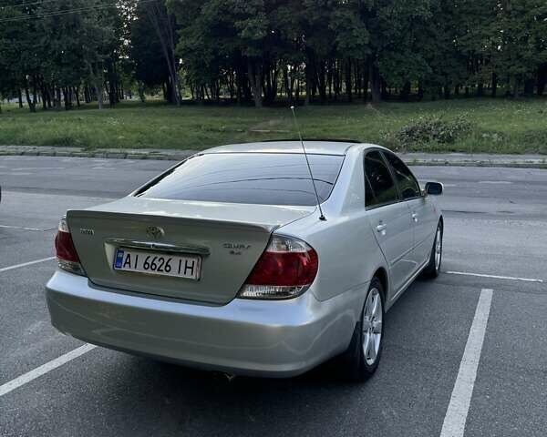 Серый Тойота Камри, объемом двигателя 2.36 л и пробегом 350 тыс. км за 6500 $, фото 5 на Automoto.ua