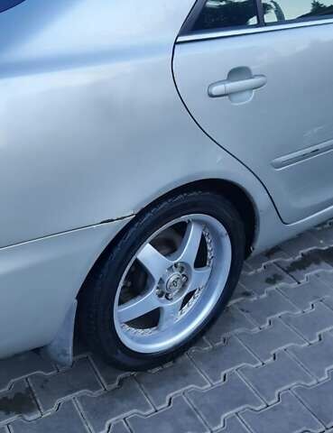 Серый Тойота Камри, объемом двигателя 3 л и пробегом 398 тыс. км за 4900 $, фото 12 на Automoto.ua