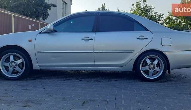 Серый Тойота Камри, объемом двигателя 3 л и пробегом 398 тыс. км за 4900 $, фото 9 на Automoto.ua