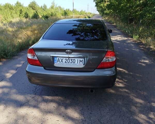 Серый Тойота Камри, объемом двигателя 2.37 л и пробегом 320 тыс. км за 5700 $, фото 19 на Automoto.ua