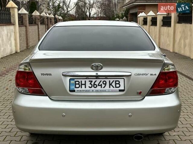 Серый Тойота Камри, объемом двигателя 2.36 л и пробегом 257 тыс. км за 8300 $, фото 34 на Automoto.ua
