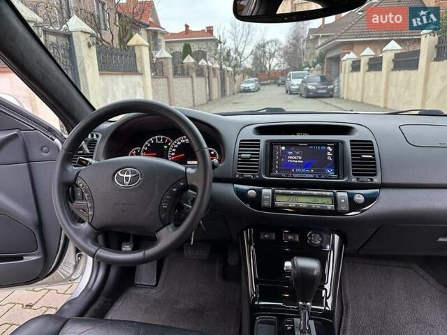 Серый Тойота Камри, объемом двигателя 2.36 л и пробегом 257 тыс. км за 8300 $, фото 59 на Automoto.ua