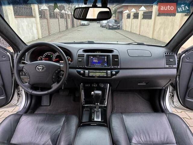 Серый Тойота Камри, объемом двигателя 2.36 л и пробегом 257 тыс. км за 8300 $, фото 60 на Automoto.ua