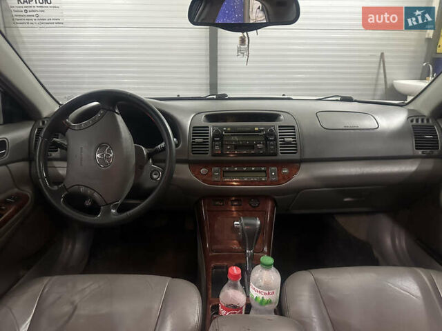 Сірий Тойота Камрі, об'ємом двигуна 3 л та пробігом 242 тис. км за 4300 $, фото 9 на Automoto.ua