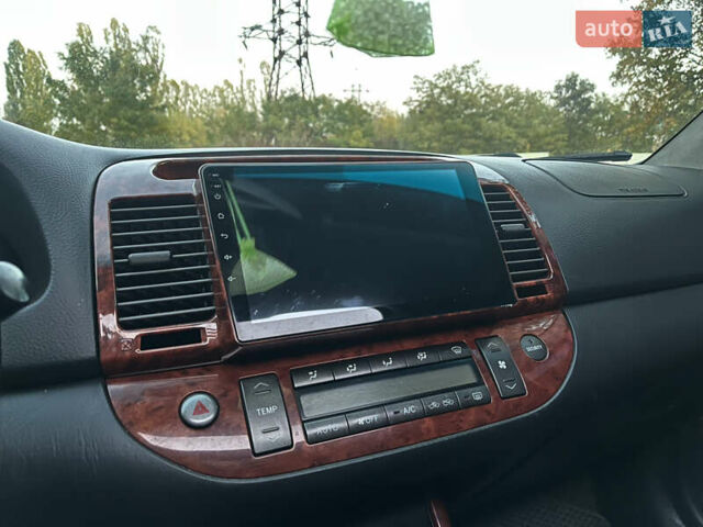 Тойота Камри 2004 в Харькове на Automoto.ua Серый Тойота Камри, объемом двигателя 3 л и пробегом 266 тыс. км за 4800 $, фото 23 на Automoto.ua