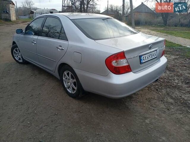 Сірий Тойота Камрі, об'ємом двигуна 2.36 л та пробігом 266 тис. км за 6750 $, фото 2 на Automoto.ua