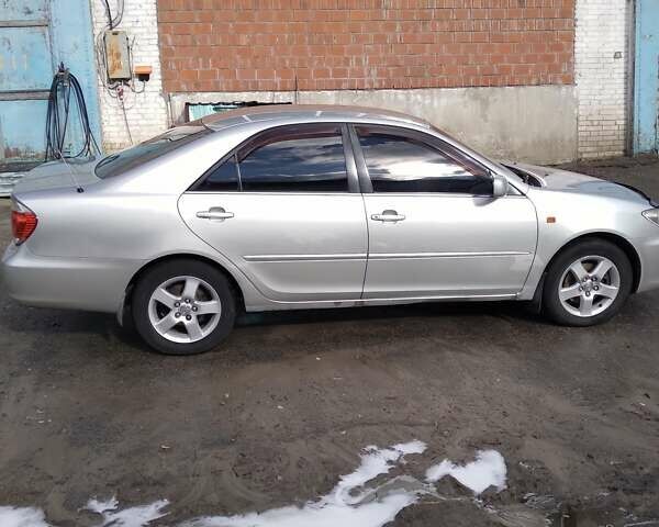 Сірий Тойота Камрі, об'ємом двигуна 2.36 л та пробігом 411 тис. км за 6000 $, фото 5 на Automoto.ua