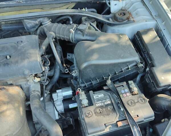 Серый Тойота Камри, объемом двигателя 2.36 л и пробегом 308 тыс. км за 4500 $, фото 18 на Automoto.ua