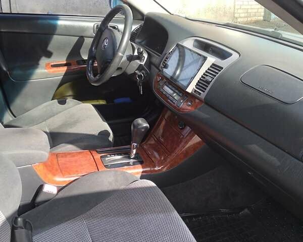 Сірий Тойота Камрі, об'ємом двигуна 2.36 л та пробігом 411 тис. км за 6000 $, фото 7 на Automoto.ua