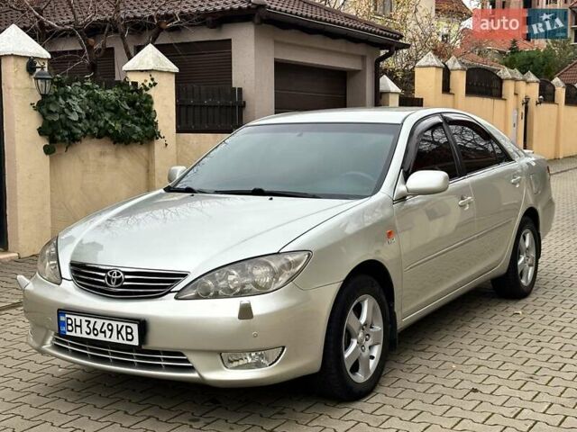 Серый Тойота Камри, объемом двигателя 2.36 л и пробегом 257 тыс. км за 8300 $, фото 28 на Automoto.ua