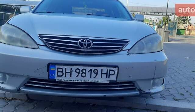 Серый Тойота Камри, объемом двигателя 3 л и пробегом 398 тыс. км за 4900 $, фото 4 на Automoto.ua