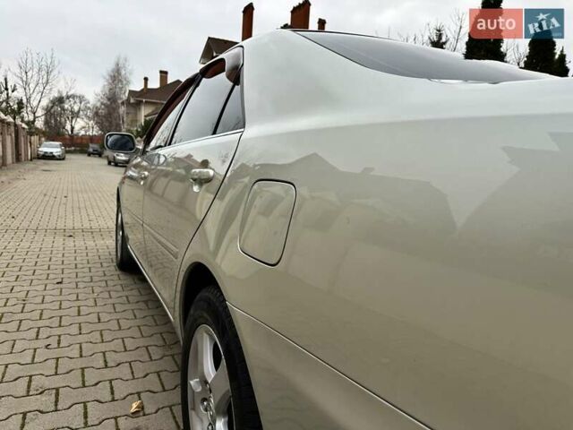 Серый Тойота Камри, объемом двигателя 2.36 л и пробегом 257 тыс. км за 8300 $, фото 40 на Automoto.ua