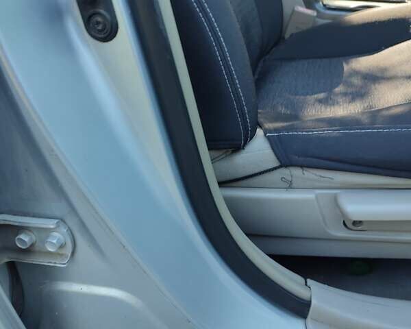 Серый Тойота Камри, объемом двигателя 2.36 л и пробегом 308 тыс. км за 4500 $, фото 16 на Automoto.ua