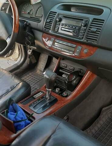 Серый Тойота Камри, объемом двигателя 3 л и пробегом 398 тыс. км за 4900 $, фото 30 на Automoto.ua