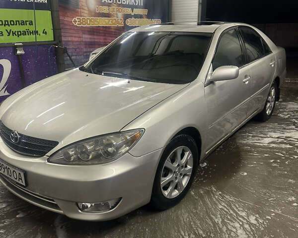 Сірий Тойота Камрі, об'ємом двигуна 3 л та пробігом 242 тис. км за 4300 $, фото 6 на Automoto.ua